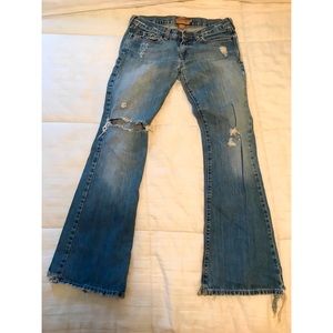 Ripped Abercrombie and Fitch jeans